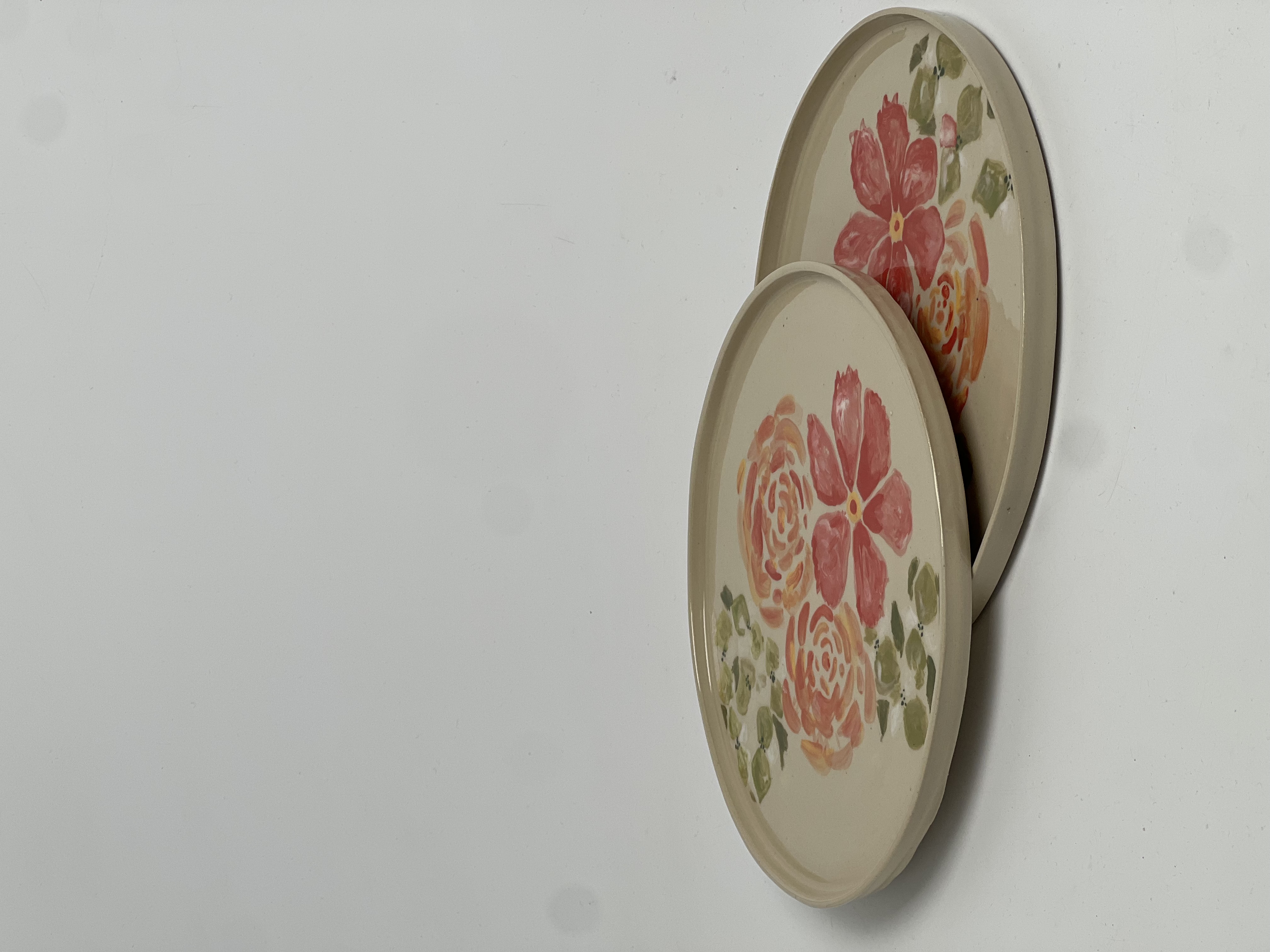 Hand-painted floral ceramic plates